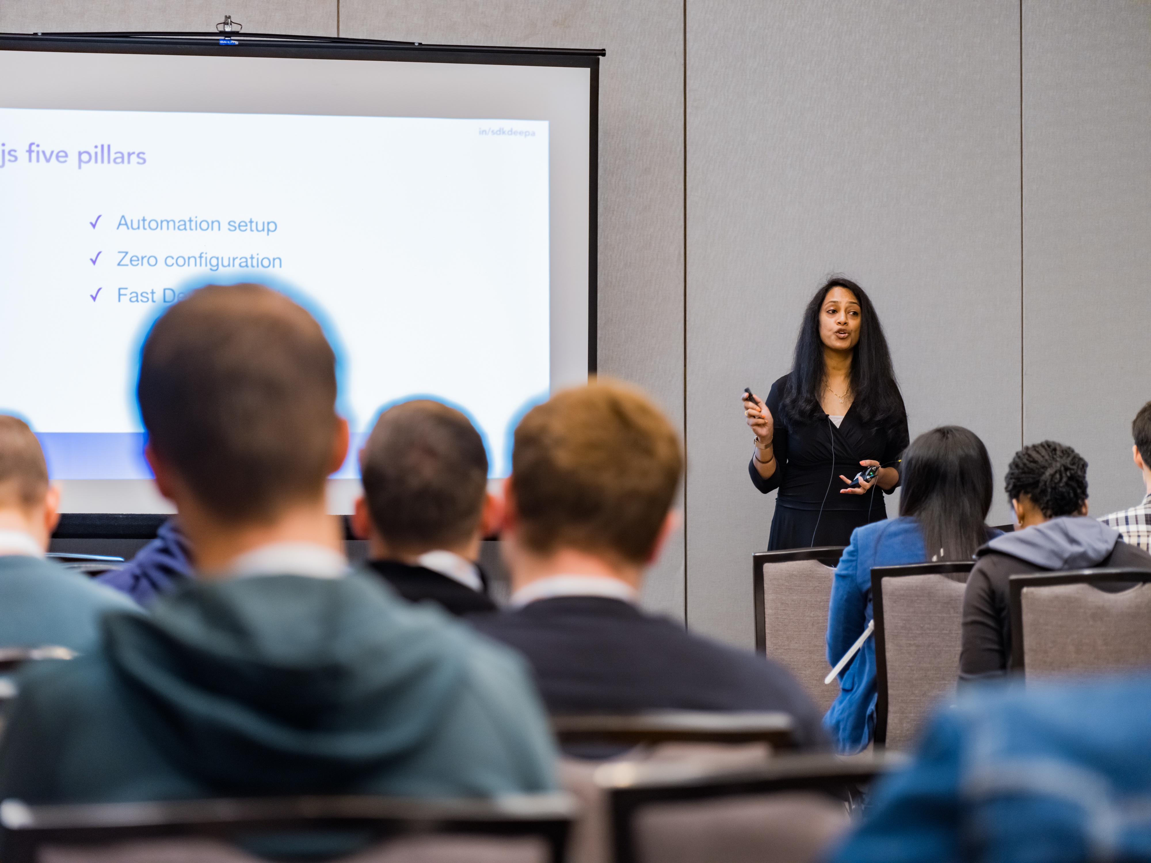 Deepa Speaking at a Tech Conference